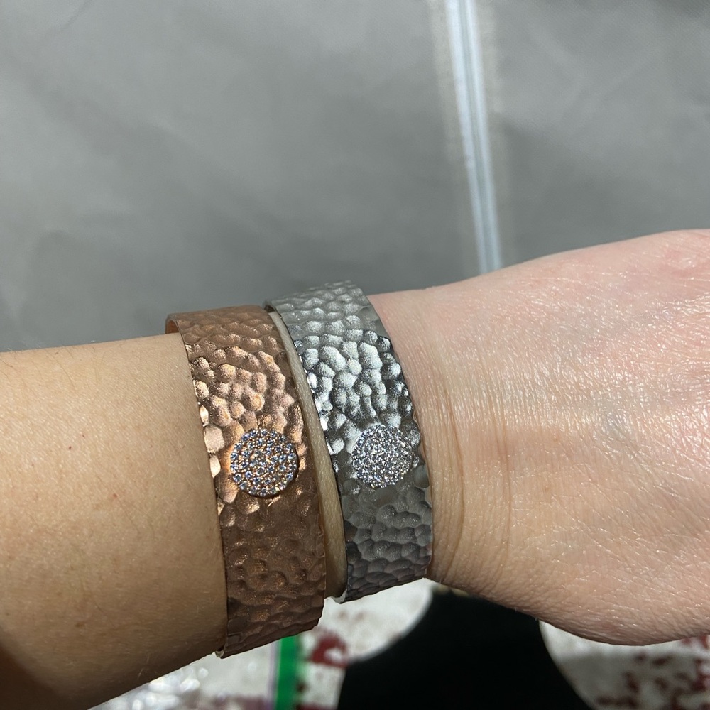 Stamped EKZ Pair of Pounded Metal Adjustable Cuff Bracelets With Rhinestones